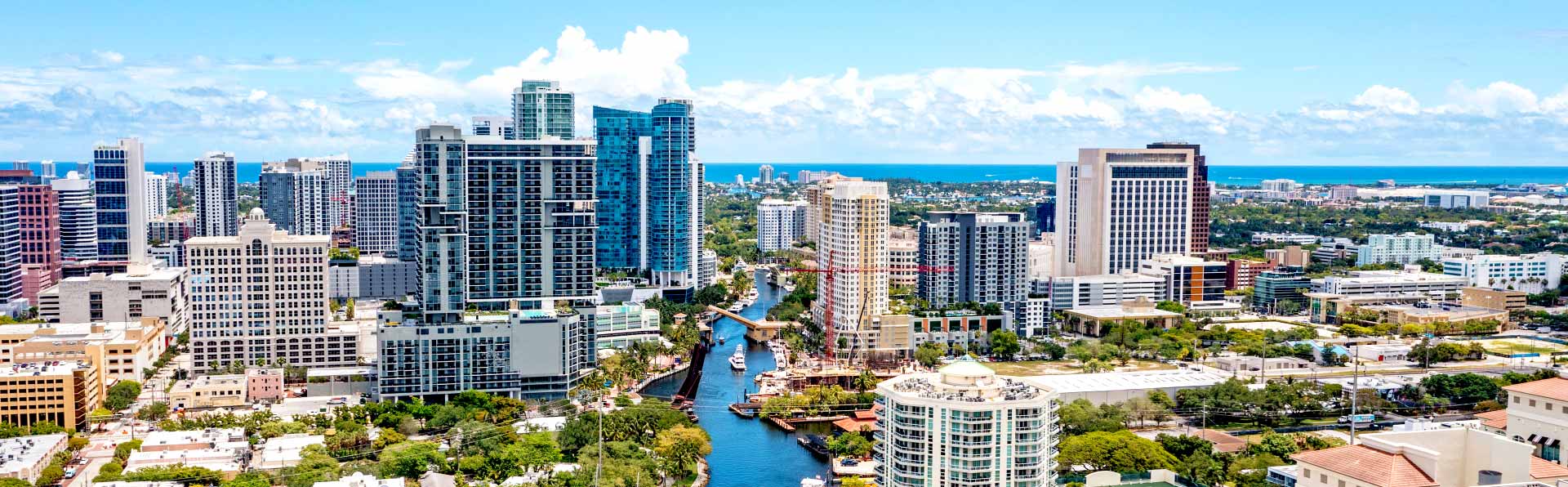 tall south Florida condo buildings next to waterway