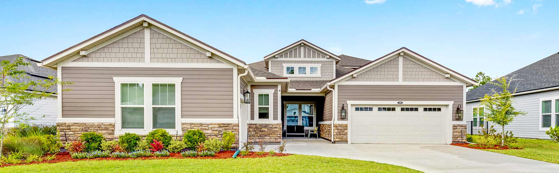 single story home with fresh landscape in a new community