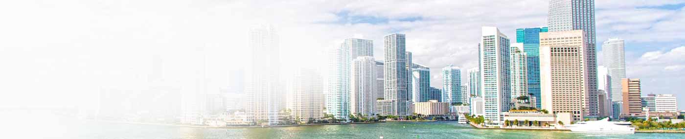 senior florida couple on bicycles on a beach