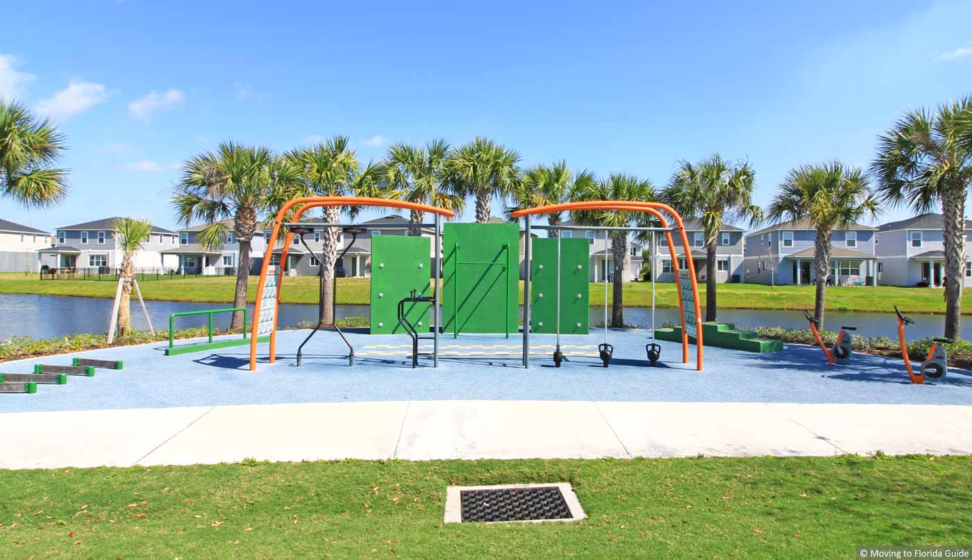 green and orhange outdoor fitness station