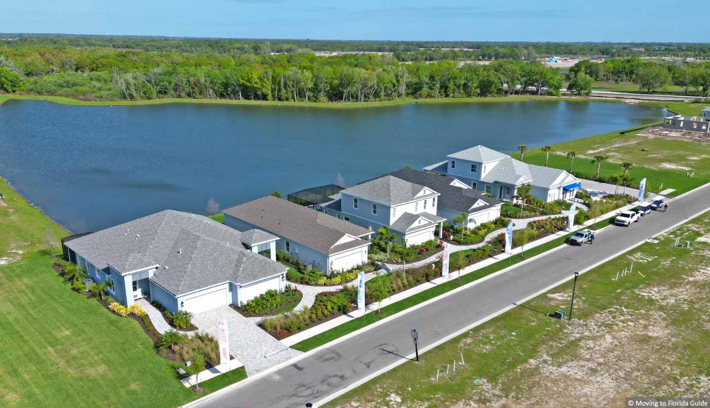 aerial view of florida model homes on a lake