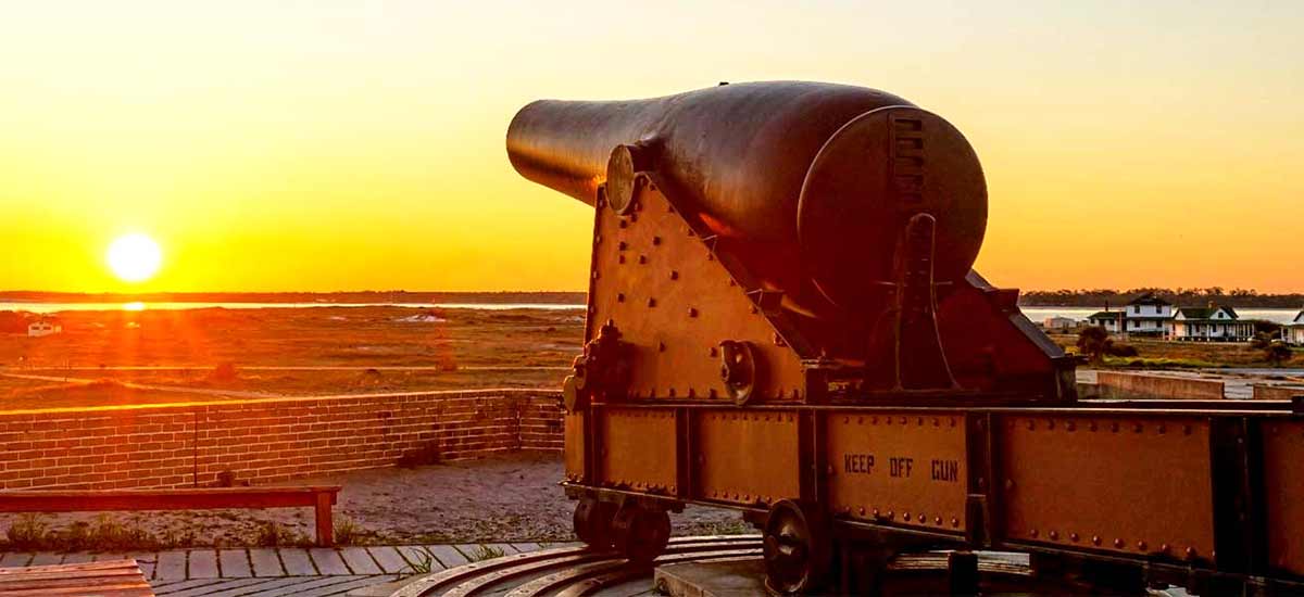 old rail cannon overlooking florida sunset