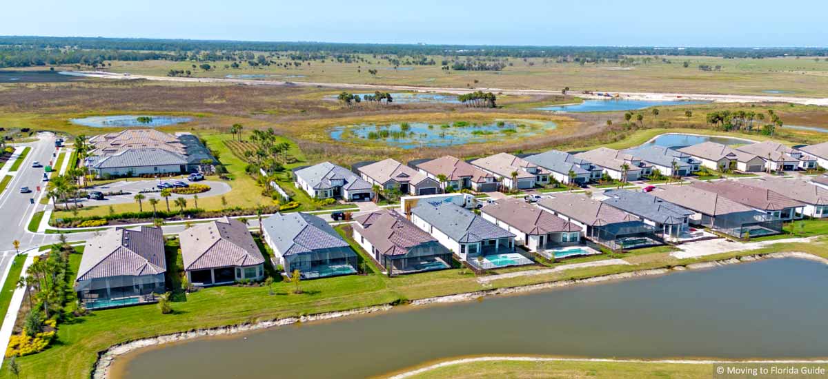 New florida homes with tile roofs and water views