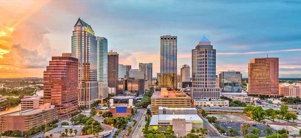 colorful buildings in Tampa skyline near sunset
